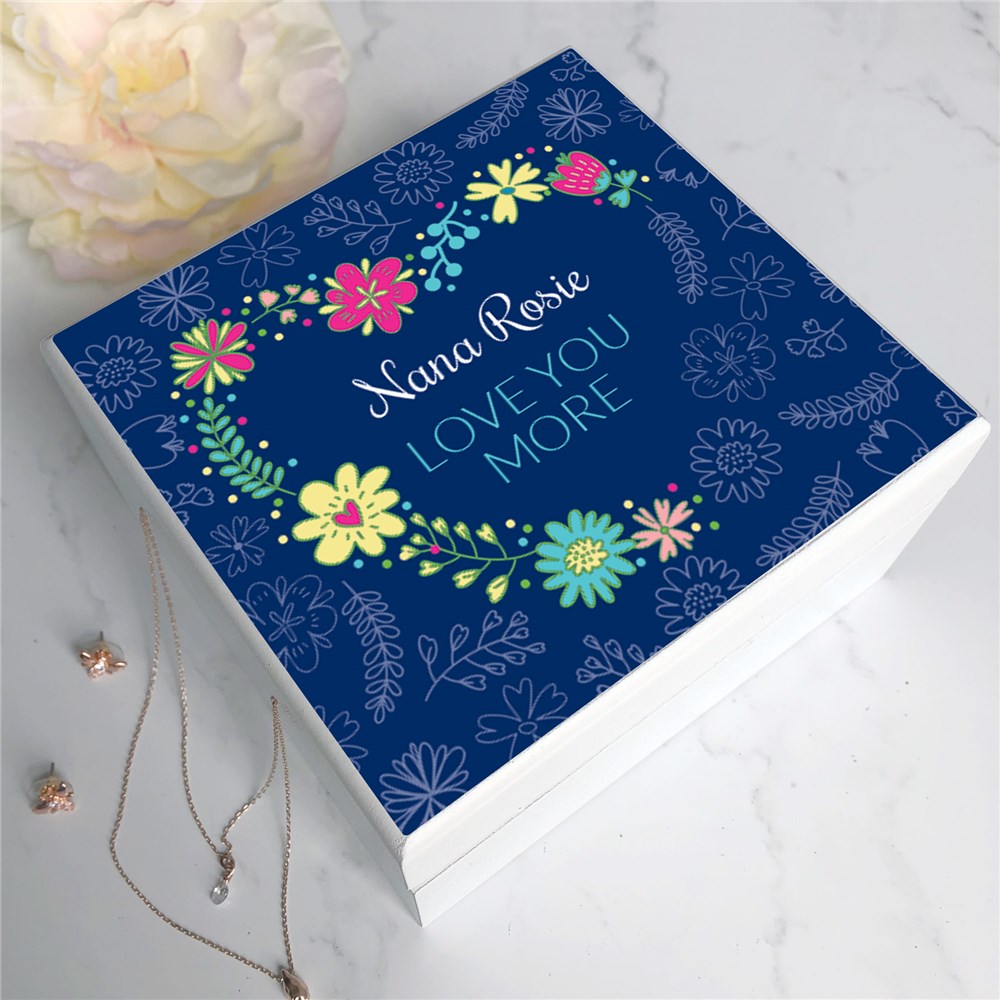 White wood jewelry box with "Love You More" text and personalized name on the lid