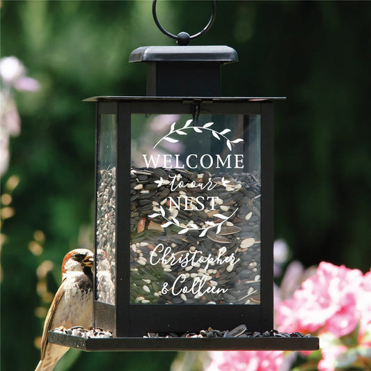 Personalized outdoor bird feeder with welcome to our nest message and wreath design, custom name and date gift, metal and glass decorative garden feeder