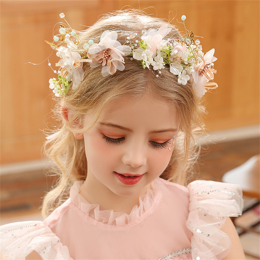 Boho floral crown for girls featuring delicate polyester flowers in white, pink, and ivory, perfect for baptisms, weddings, and first communions.