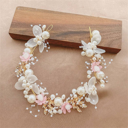 Elegant bohemian floral wreath in white, pink, and ivory, ideal for flower girls, first birthdays, and photo shoots.