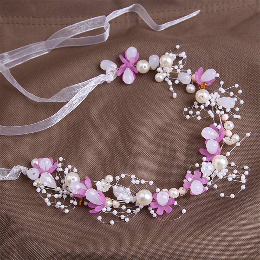 Adjustable floral halo headpiece, a beautiful addition to any little girl’s special occasion outfit.