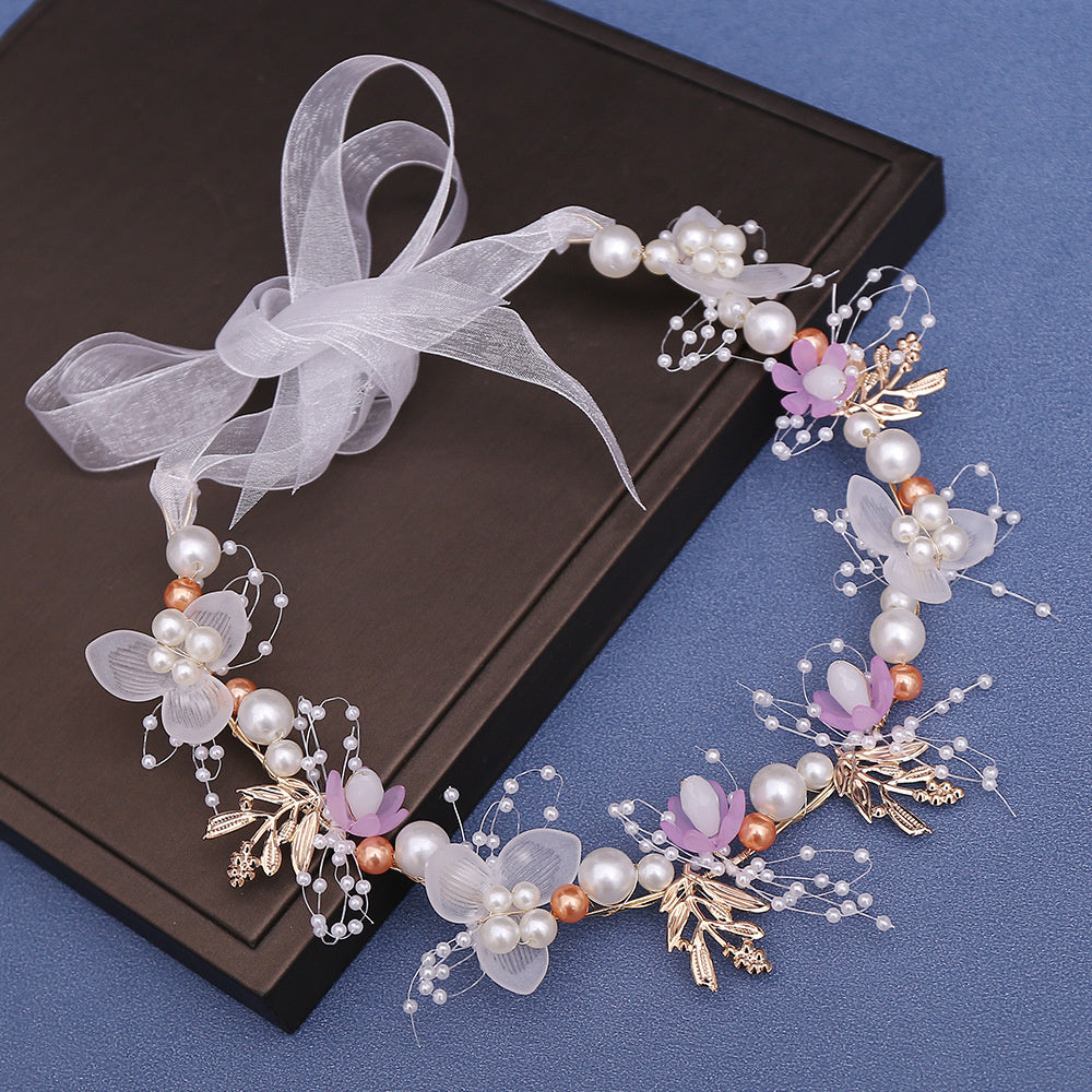 Versatile flower crown in white, pink, and ivory, designed to add a touch of elegance to any child’s special moment.