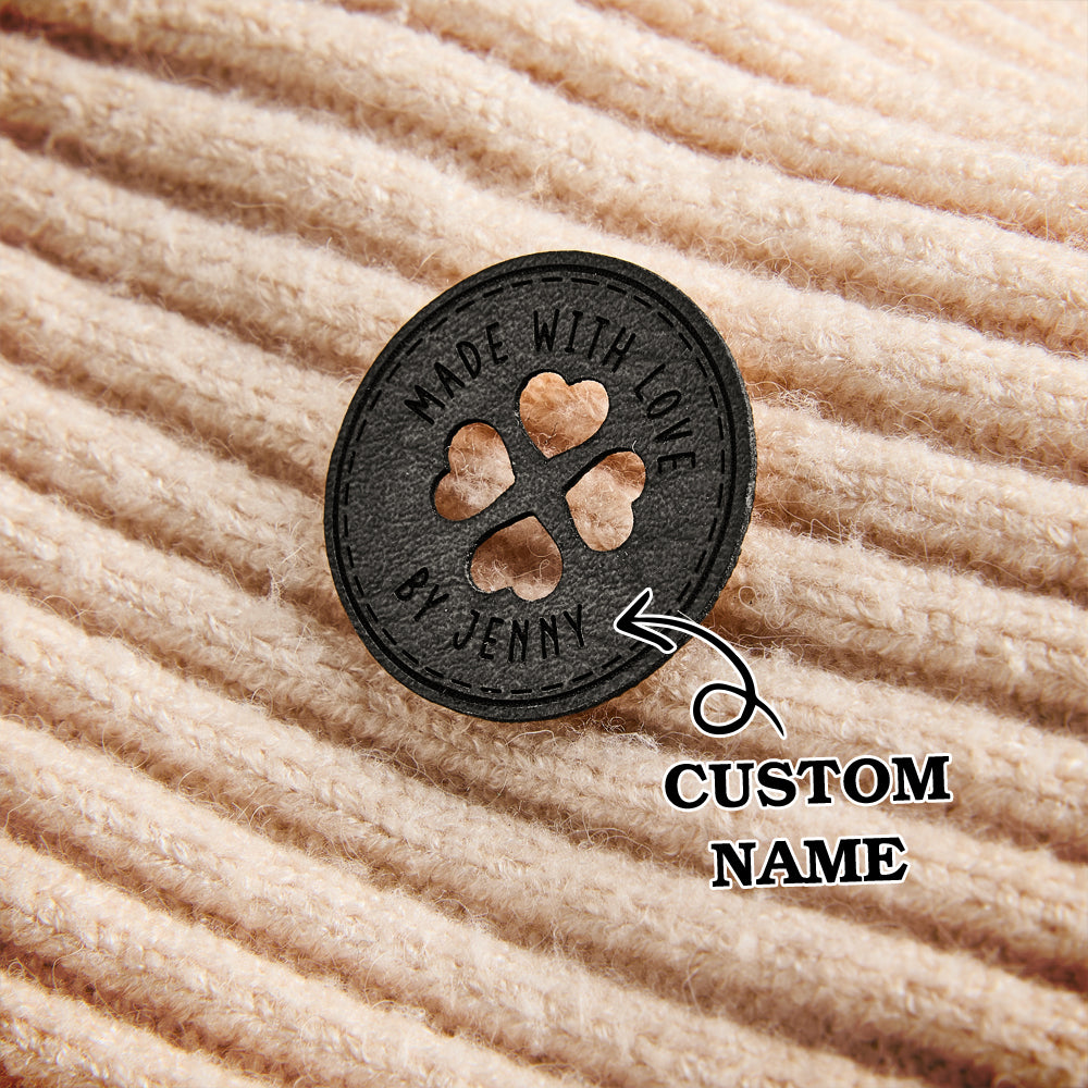 Custom PU leather labels with engraved names, ideal for small business branding, crochet accessories, and knitting projects.