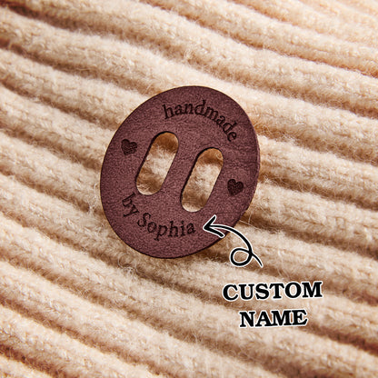 Engraved PU leather sewing labels for handmade products. Custom product tags for knitting, crochet, and crafting businesses.