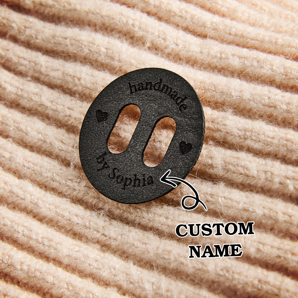 Durable personalized leather labels for handmade gifts, knitting, and crochet accessories. Engraved craft tags for small businesses.