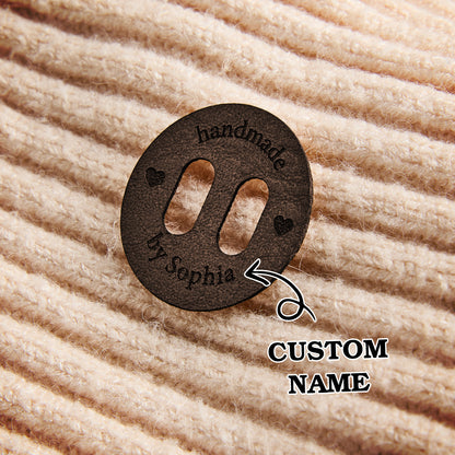 Custom leather craft labels for knitters and crocheters. Handmade business branding with personalized engraving.