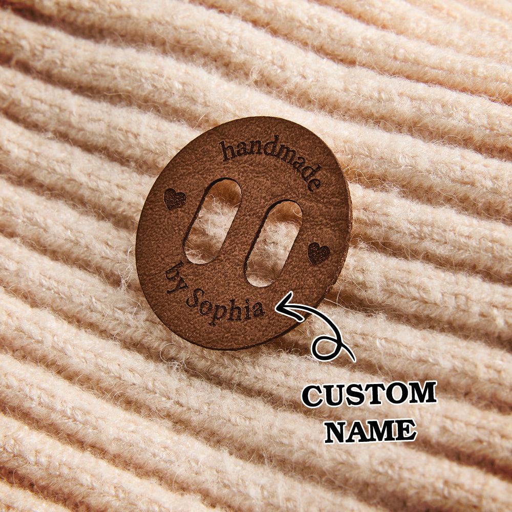 Personalized PU leather tags with engraved names for artisan sewing, crochet, and knitting projects. Ideal for small businesses.