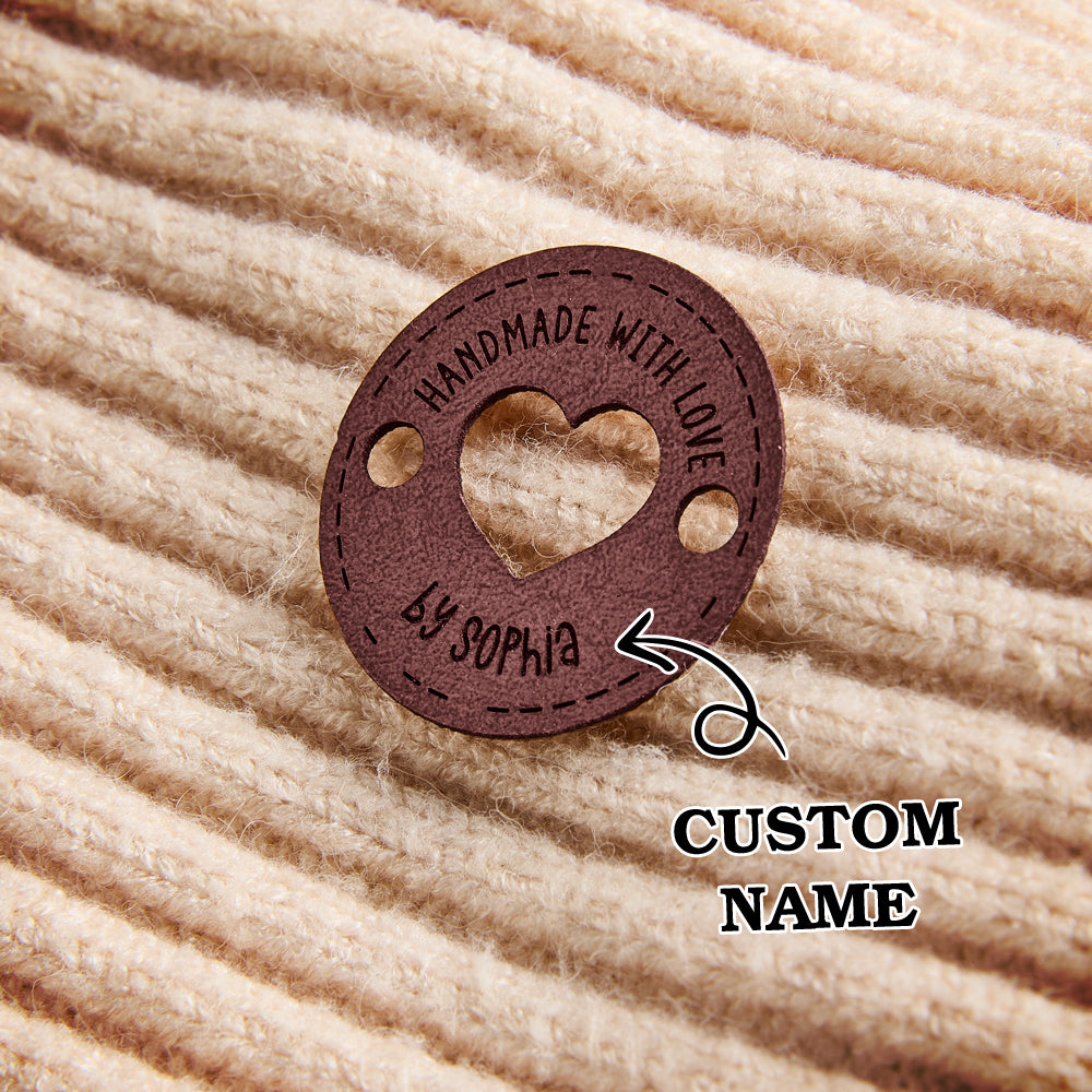 Custom engraved leather tags for handmade knitting and crochet projects. Personalized PU leather labels for small business branding.