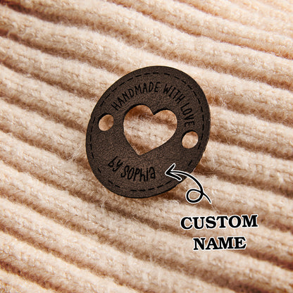 Durable leather name tags for handmade businesses. Ideal for knitters and crocheters who want to add a personalized touch to their creations.