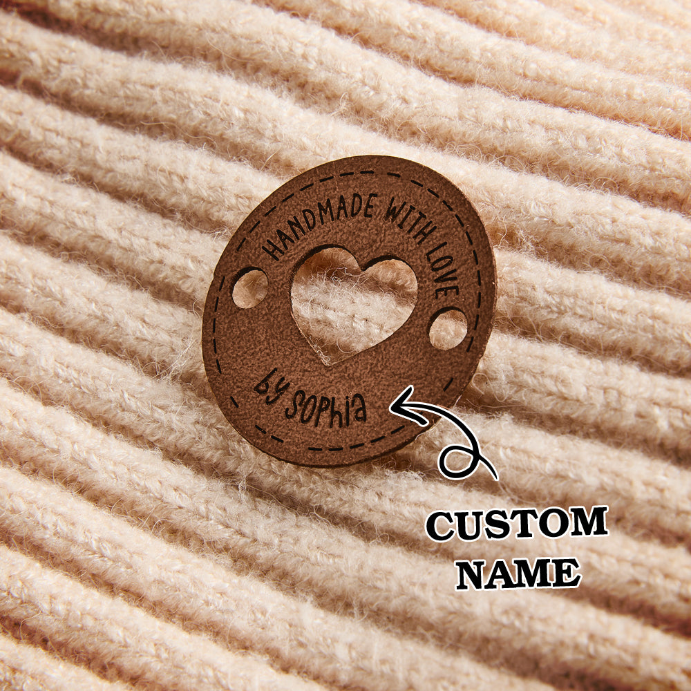 Handmade PU leather labels for knitting, sewing, and crochet projects. Custom engraving available for small business branding.