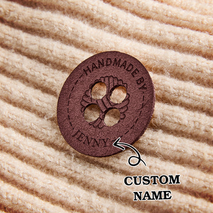 Custom leather sewing labels for handcrafted projects. Personalized name engraving for crafters and artisan business owners.