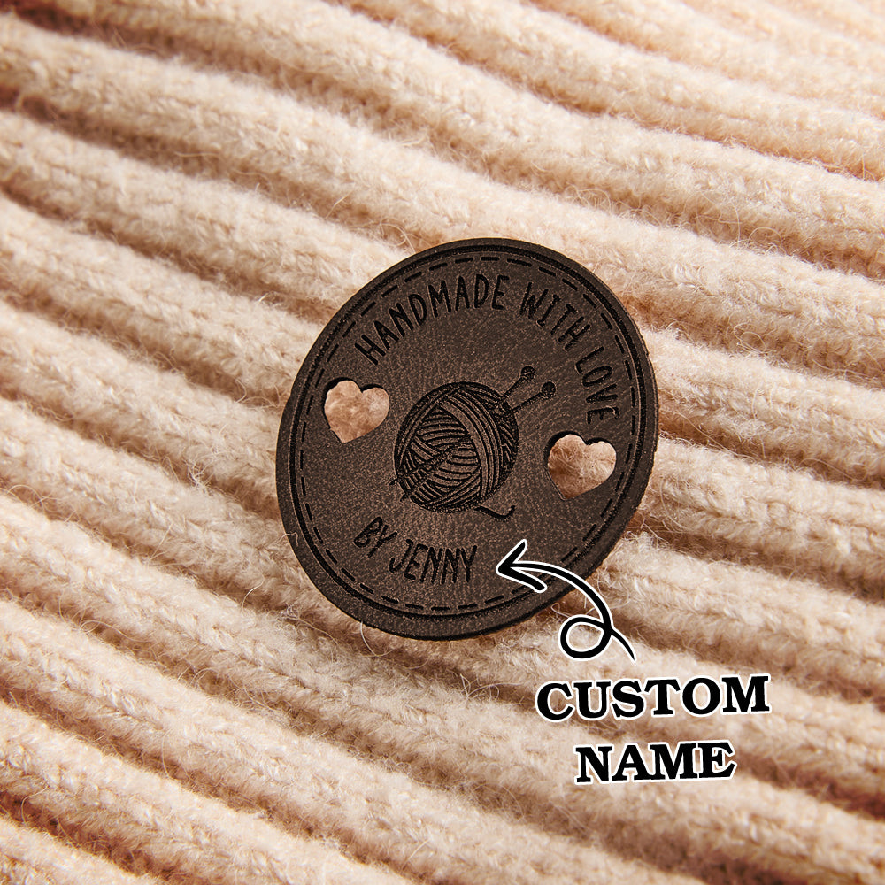 Personalized knitting and crochet product labels. Engraved leather name tags for handmade blankets, scarves, and sweaters.