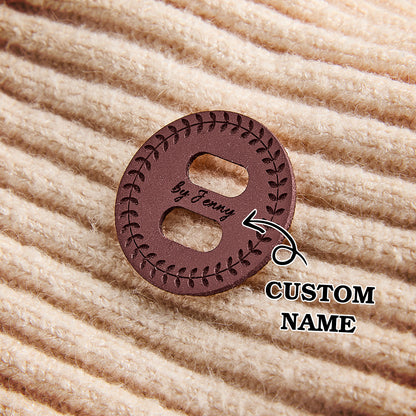 Custom faux leather craft labels with engraved names for knitting, crochet, and handmade sewing projects. Perfect for small business branding.