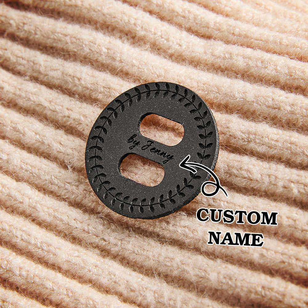 Personalized synthetic leather garment labels for handmade knitwear, crochet blankets, and custom sewing projects.
Engraved vegan leather tags for fiber artists, perfect for labeling handmade scarves, sweaters, and small business products.