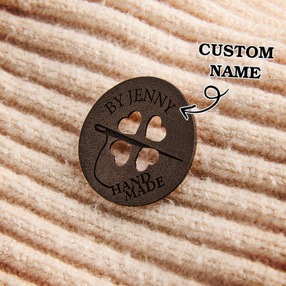 Durable synthetic leather sewing labels for crafters, artisans, and small business owners creating unique handmade products.