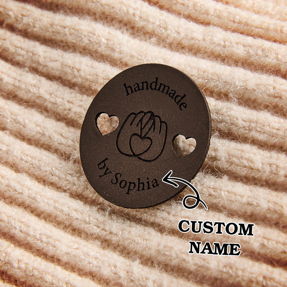 Personalized craft labels made from synthetic leather. Great for custom branding on knitwear, crochet, and DIY sewing projects.