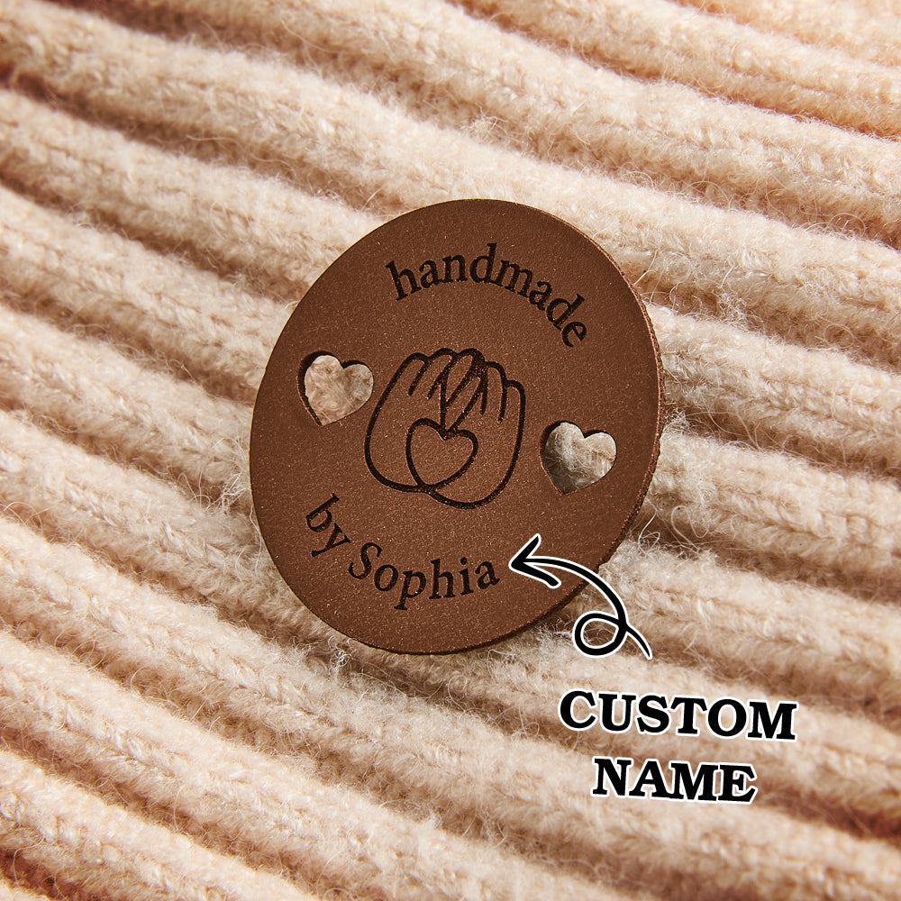 Engraved leatherette sewing labels with personalized name engraving. Ideal for branding small business handmade goods.