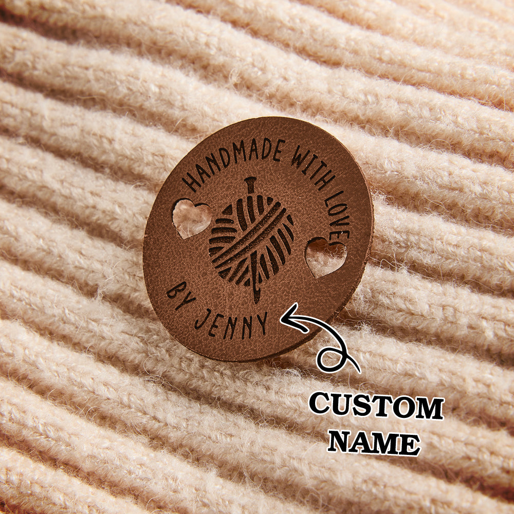 Personalized synthetic leather craft labels with custom engraving for fiber artists, knitters, and crocheters.