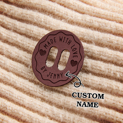 Durable faux leather sewing labels for handmade garment branding, DIY craft projects, and knitting businesses.