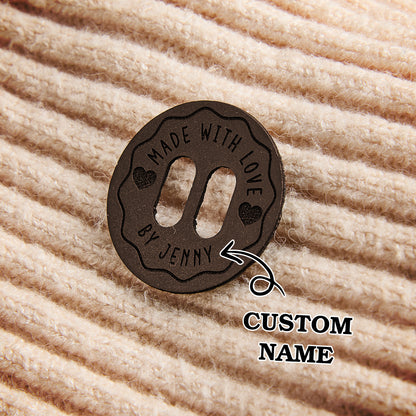 Engraved PU leather knitting labels for scarves, sweaters, and personalized fiber art products.