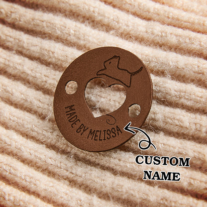 Personalized faux leather labels with custom engraving. Great for handmade accessories and knitwear branding.