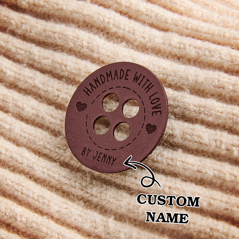 Engraved leather sewing labels for branding small business handmade products, including crochet and fiber arts.