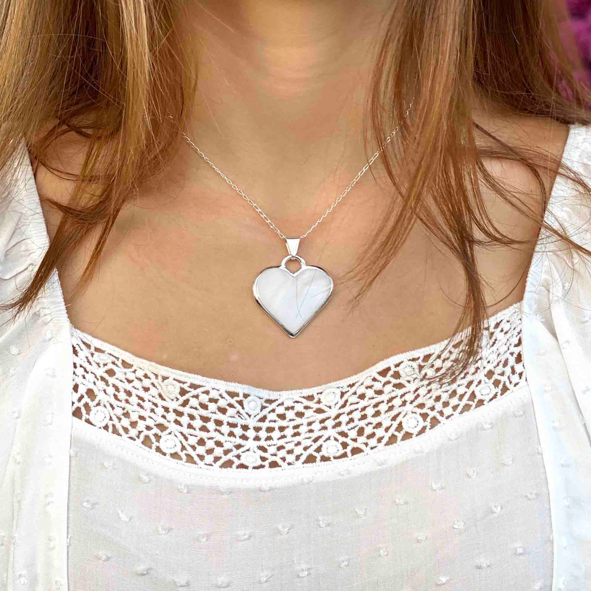 White heart pendant with natural shell on alpaca silver chain, handmade in Mexico