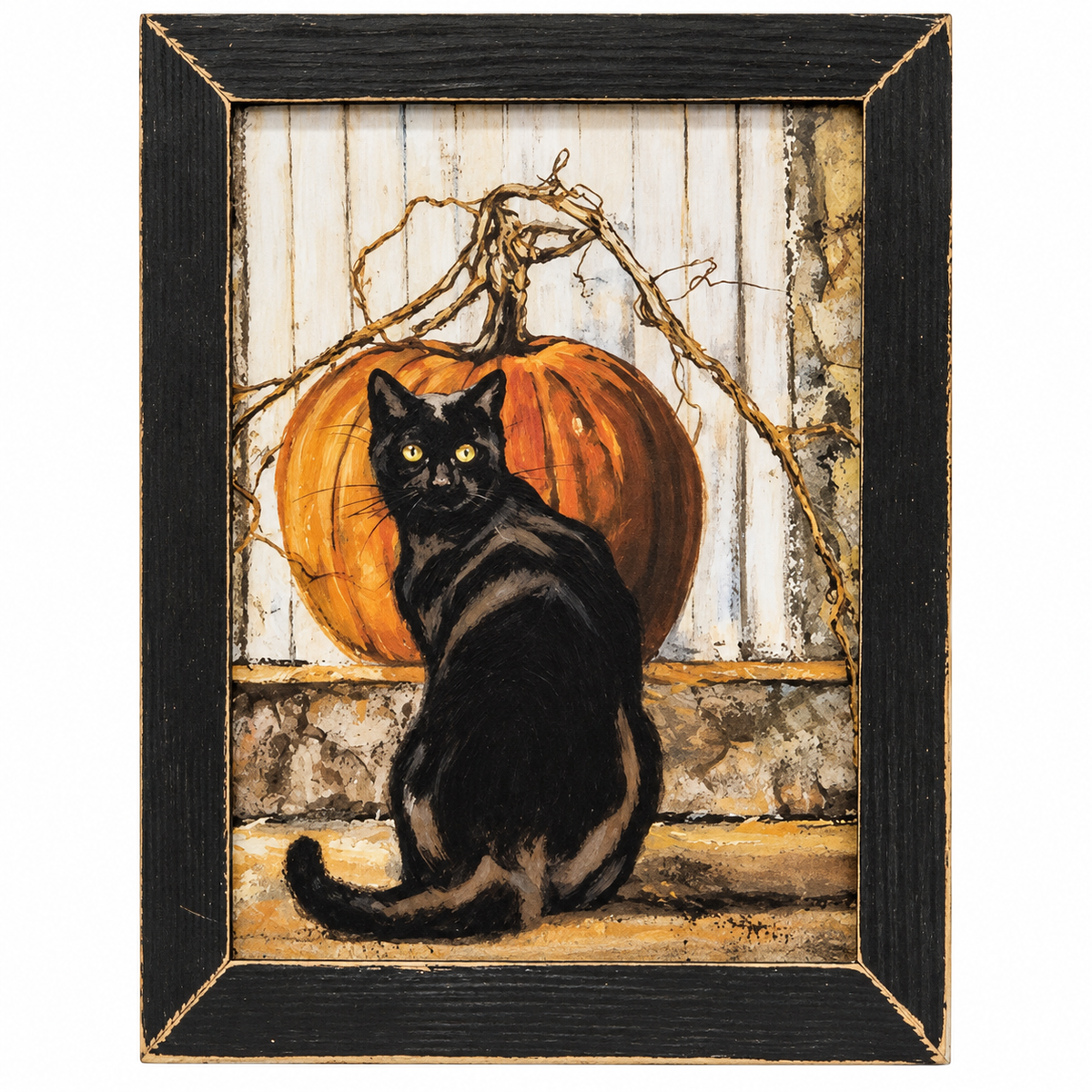 A framed art print depicting a black cat sitting in front of a large orange pumpkin, set against a rustic white wooden fence and stone wall background.