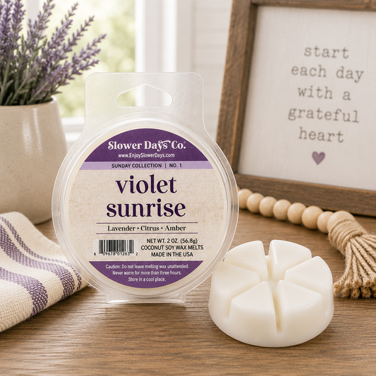 Violet Sunrise coconut soy wax melts with lavender, citrus, and amber fragrance in Slower Days Sunday collection packaging.