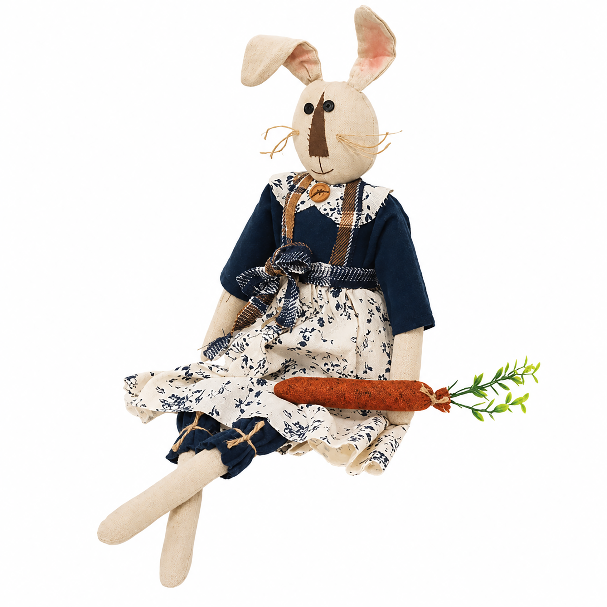 Vintage-inspired Avery rabbit rag doll featuring long dangling legs, stuffed fabric construction, charming country clothing, and a felt carrot, bringing homespun character to mantels, shelves, entryway benches, and seasonal spring displays.