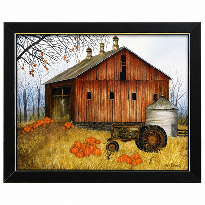 Framed wall art featuring a painted autumn barn scene with a red wooden barn, silo, tractor, pumpkins, and bare trees, shown in a black frame with a gold inner border.
