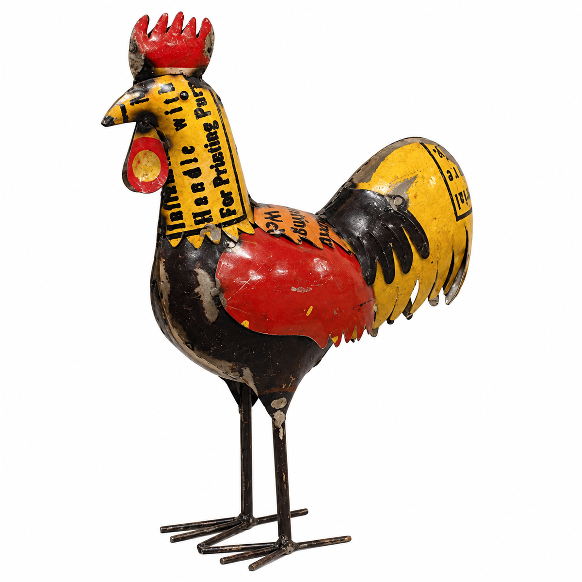 A vintage painted metal rooster figurine with a distressed finish, featuring red, yellow, and black colors with printed text details, shown against a plain white background.