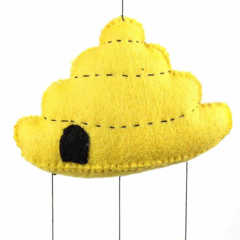 Nature-inspired beehive nursery mobile, a charming eco-friendly baby room decoration.