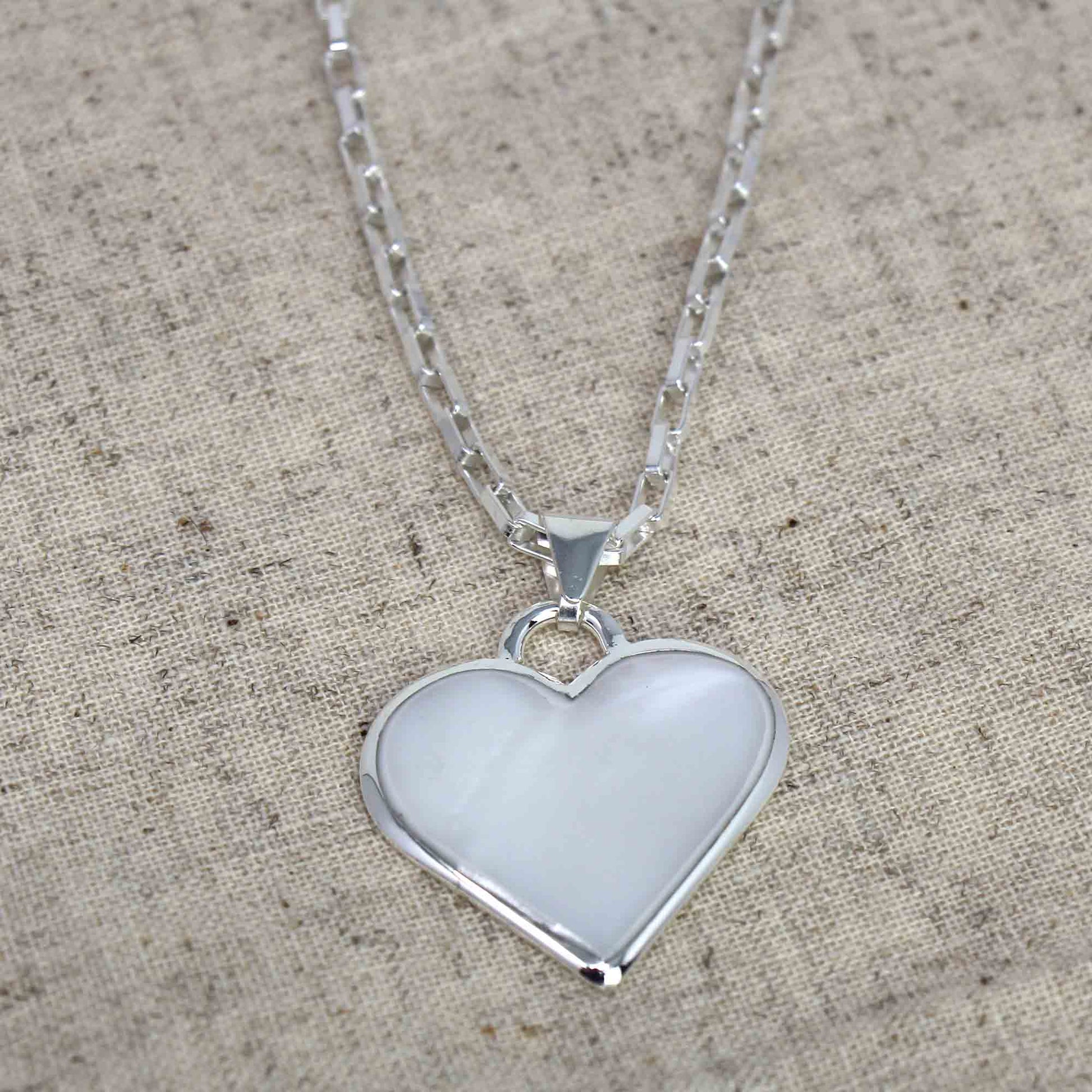 Fair trade heart pendant from Mexico with natural materials