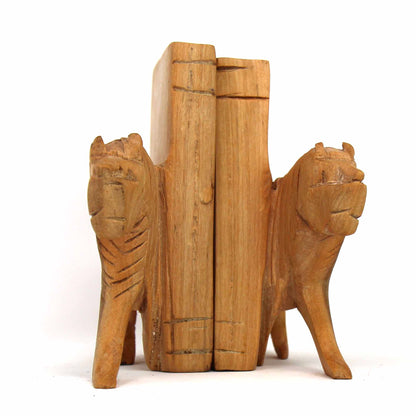 Close-up of natural wood lion sculpture featured on bookend