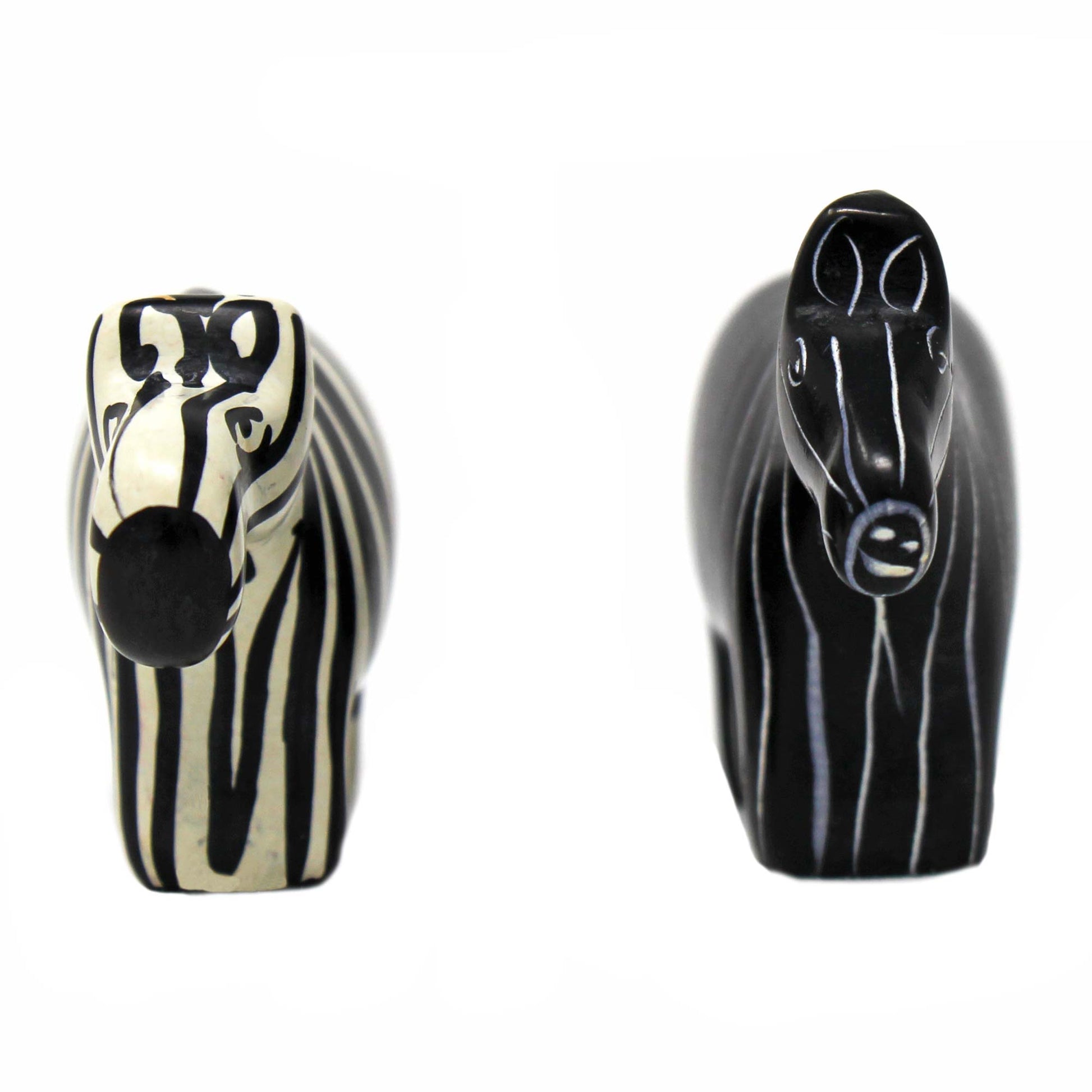Small soapstone zebras with opposing finishes for balanced decor