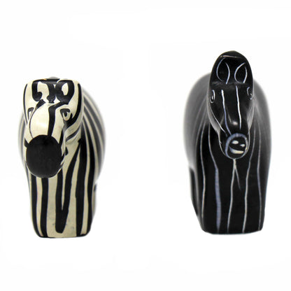 Small soapstone zebras with opposing finishes for balanced decor