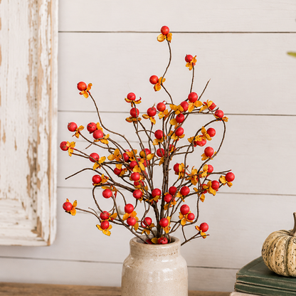Bittersweet fall spray with small red berries, orange silk leaves, and handwrapped stems.