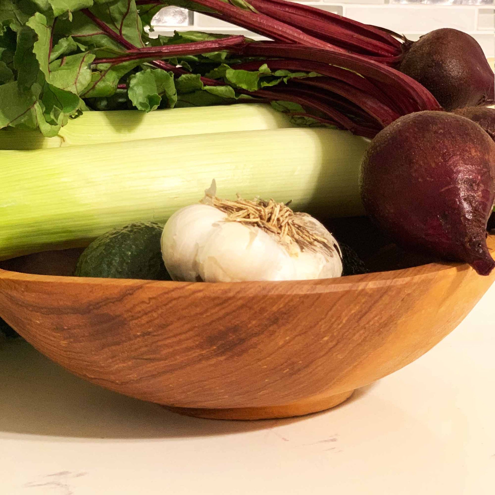 Kenyan handmade olive wood bowl, ethically sourced for sustainable dining.