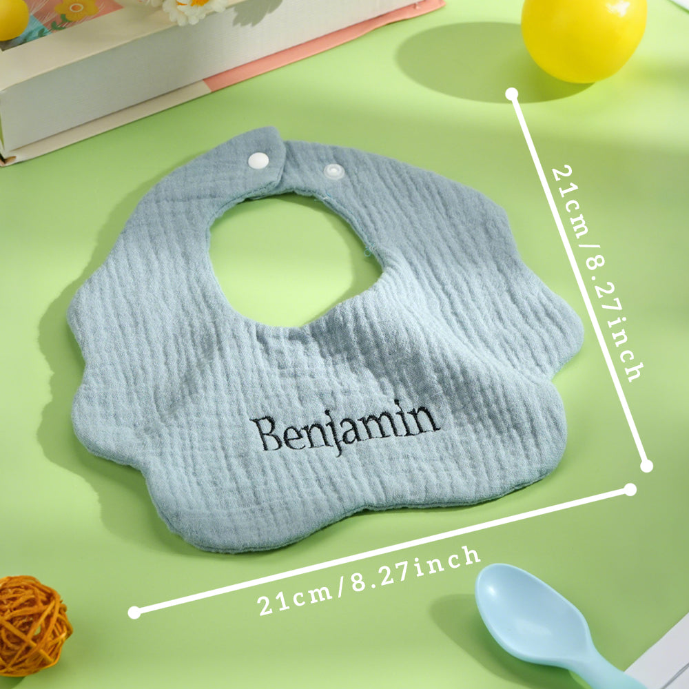 Blue personalized baby bib with overlay text showing the size, perfect for newborns. Customize with baby’s name for a personal touch.