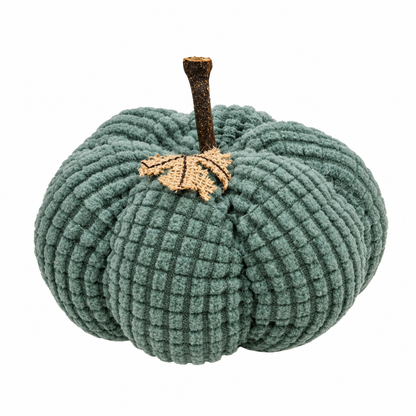 A ribbed knit decorative pumpkin in muted sage green with a brown stem and a small tan leaf accent, shown on a plain white background.