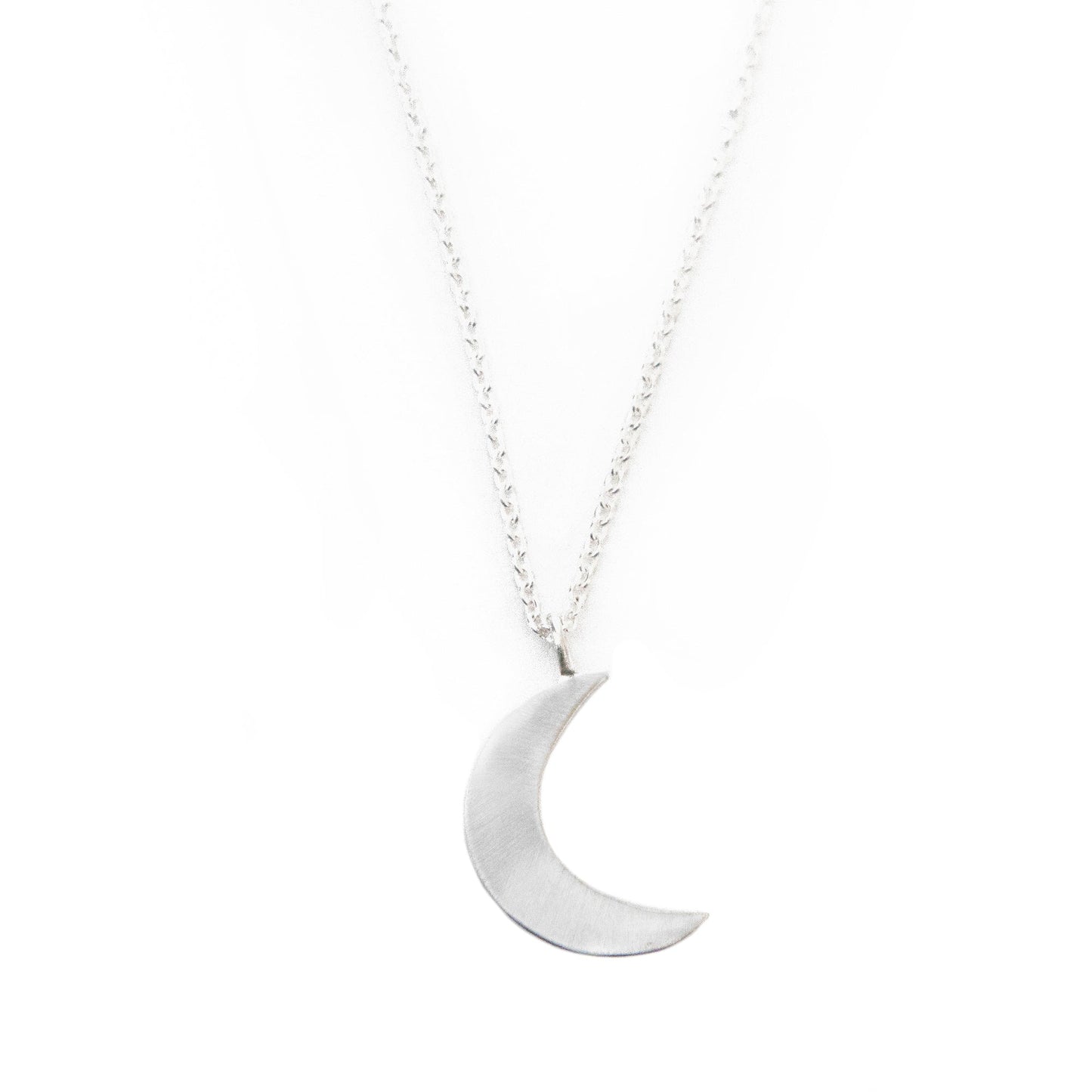 Silver polished crescent moon necklace with adjustable chain, handcrafted by artisans in India.