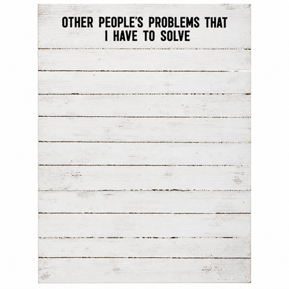 A rectangular notepad with distressed horizontal wood planks design and black text at the top reading, 'OTHER PEOPLE'S PROBLEMS THAT I HAVE TO SOLVE.'.