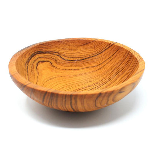 Hand-carved olive wood bowl, sustainably sourced and crafted by Kenyan artisans.