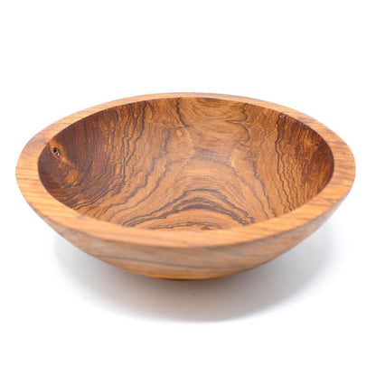 Hand-carved olive wood bowl, sustainably crafted in Kenya with a unique natural grain.