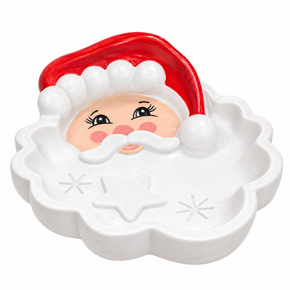 A Santa Claus-themed dish with a white scalloped rim, a red hat, and a painted face with black eyes, pink cheeks, and a white mustache, shown on a plain white background.