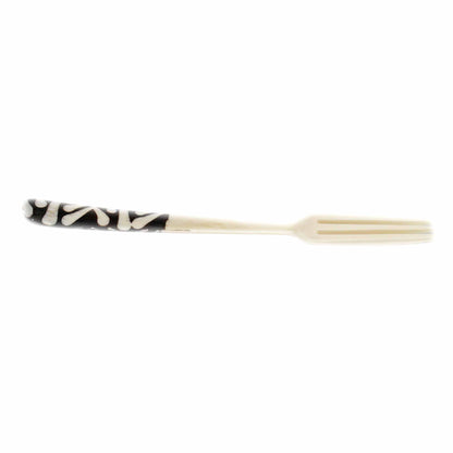 Handcrafted Kenyan appetizer utensils as part of a cultural home décor collection