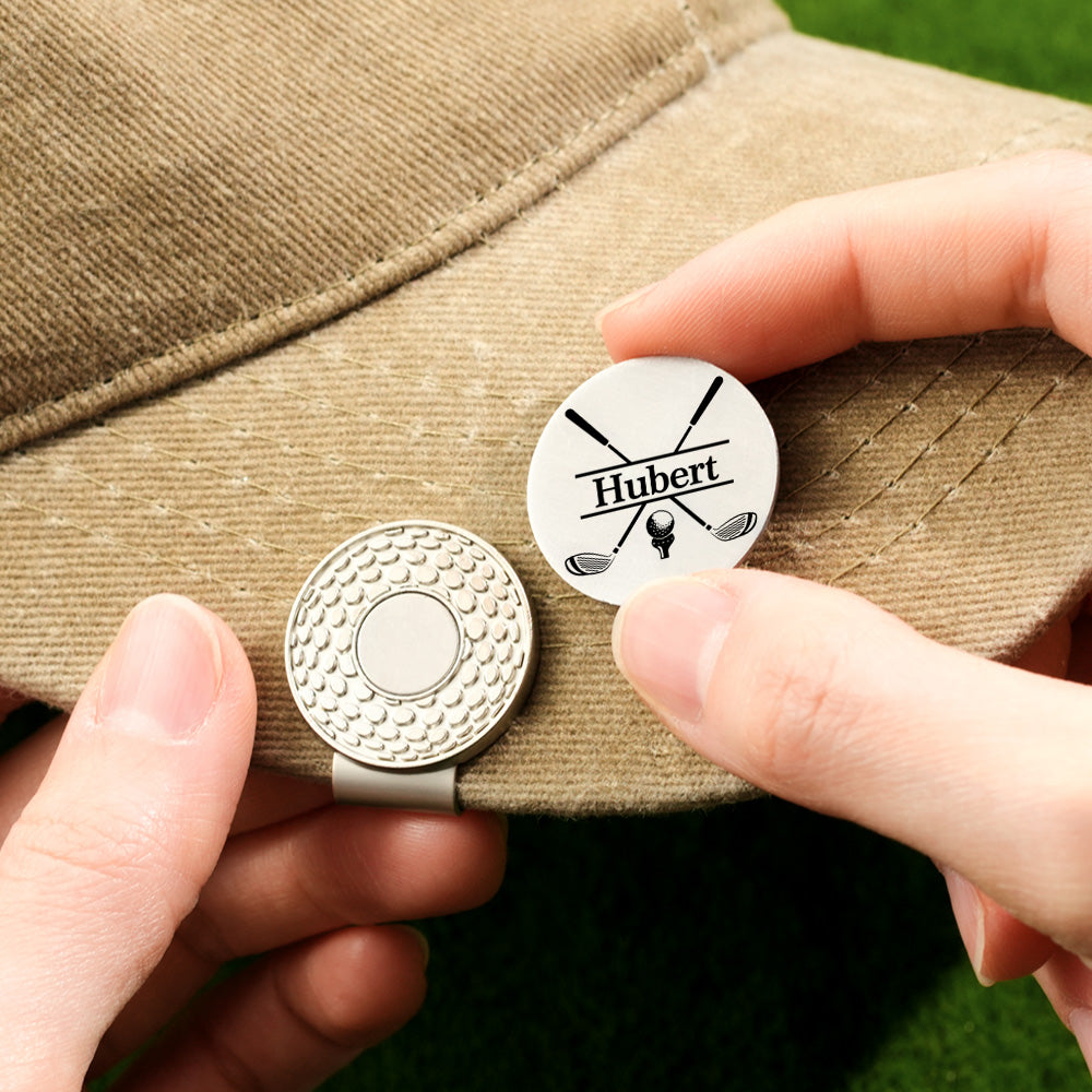 A personalized golf ball marker with a removable magnetic design, showing how the customizable piece detaches from the hat clip for easy access and convenience on the course.