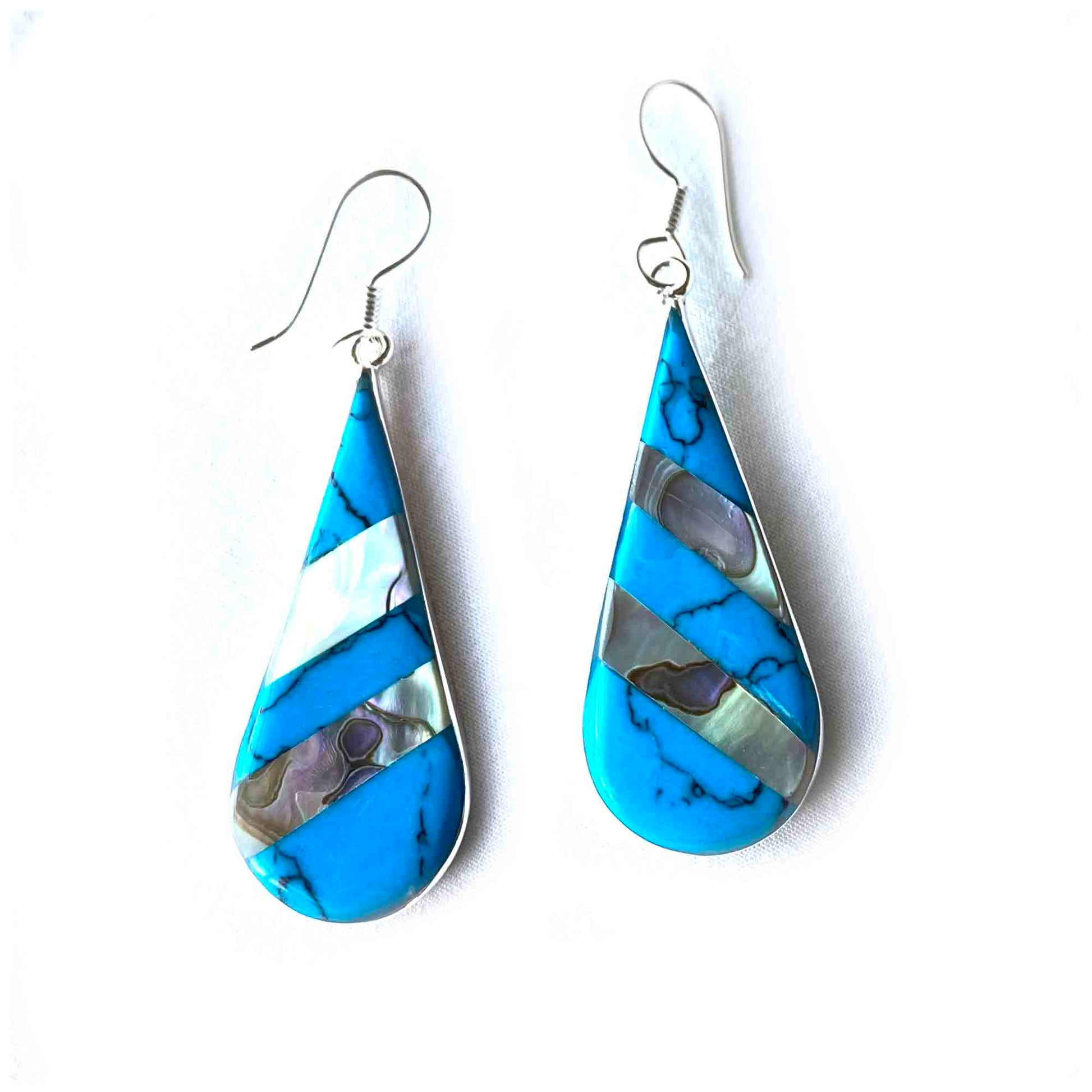 Elegant turquoise and abalone earrings with unique teardrop design.