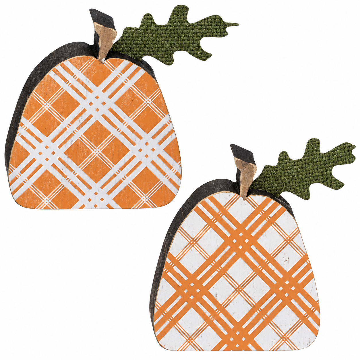 Two decorative pumpkin-shaped wall hangings with orange and white plaid patterns, dark green textured leaves, and brown stem accents, shown on a plain white background.